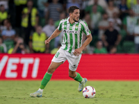 Pablo Fornals of Real Betis runs with the ball during the La Liga EA Sports match between Real Betis and CD Leganes at Benito Villamarin in...