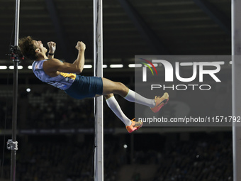 Armand Duplantis of Sweden reacts in the air while he competes in the Men's Pole Vault during the Wanda Diamond League 2024 final event, an...