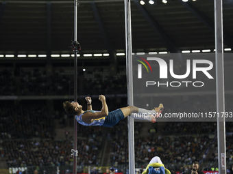 Armand Duplantis of Sweden reacts in the air while he competes in the Men's Pole Vault during the Wanda Diamond League 2024 final event, an...