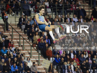 Armand Duplantis of Sweden reacts in the air while he competes in the Men's Pole Vault during the Wanda Diamond League 2024 final event, an...