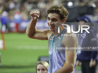 Armand Duplantis of Sweden reacts and celebrates as he competes in the Men's Pole Vault during the Wanda Diamond League 2024 final event, an...