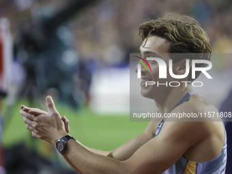 Armand Duplantis of Sweden reacts and celebrates as he competes in the Men's Pole Vault during the Wanda Diamond League 2024 final event, an...