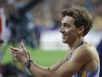 Armand Duplantis of Sweden reacts and celebrates as he competes in the Men's Pole Vault during the Wanda Diamond League 2024 final event, an...