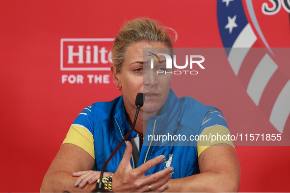 GAINESVILLE, VIRGINIA - SEPTEMBER 13: Captain Suzann Pettersen of of Team Europe speaks to the media during Day One of the Solheim Cup at Ro...