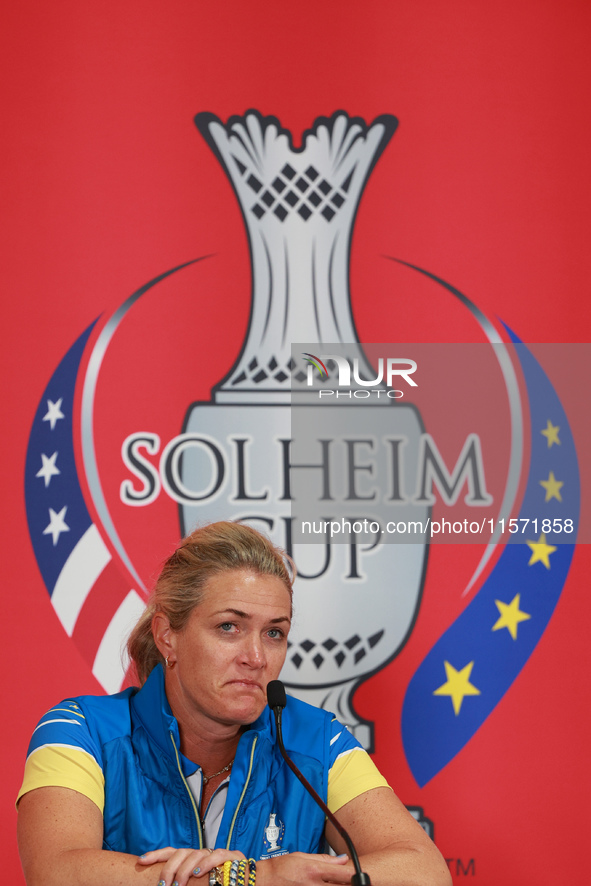 GAINESVILLE, VIRGINIA - SEPTEMBER 13: Captain Suzann Pettersen of of Team Europe speaks to the media during Day One of the Solheim Cup at Ro...