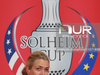 GAINESVILLE, VIRGINIA - SEPTEMBER 13: Captain Suzann Pettersen of of Team Europe speaks to the media during Day One of the Solheim Cup at Ro...