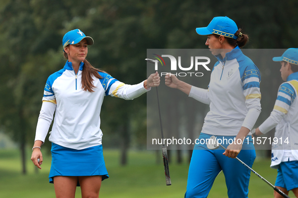 GAINESVILLE, VIRGINIA - SEPTEMBER 13: Linn Grant of of Team Europe celebrates her putt on the second green with teammate Carlota Ciganda dur...