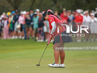 GAINESVILLE, VIRGINIA - SEPTEMBER 13: Lilia Vu of of Team USA follows her putt on the third green during Foursome Matches on Day One of the...