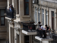 People on balconies during first practice ahead of the Formula 1 Grand Prix of Azerbaijan at Baku City Circuit in Baku, Azerbaijan on Septem...