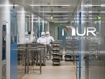 A worker produces diclofenac sodium injection at a pharmaceutical company in Suqian, China, on September 13, 2024. (