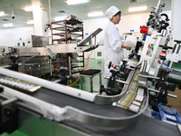 A worker produces diclofenac sodium injection at a pharmaceutical company in Suqian, China, on September 13, 2024. (