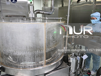 A worker produces diclofenac sodium injection at a pharmaceutical company in Suqian, China, on September 13, 2024. (