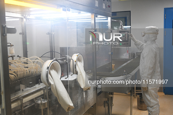 A worker produces diclofenac sodium injection at a pharmaceutical company in Suqian, China, on September 13, 2024. 