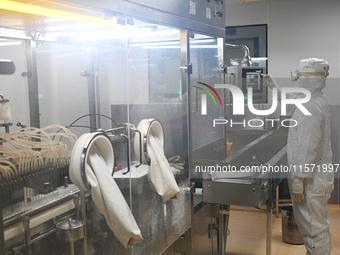 A worker produces diclofenac sodium injection at a pharmaceutical company in Suqian, China, on September 13, 2024. (