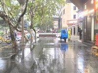 Citizens travel in the rain in Chengdu, China, on September 14, 2024. (