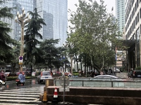 Citizens travel in the rain in Chengdu, China, on September 14, 2024. (