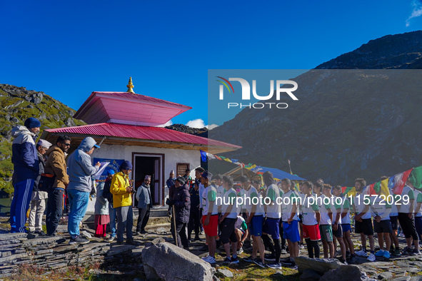 Runners participate in the first Timbung Pokhari Trail Run competition in Taplejung, Nepal, on September 11, 2024. 