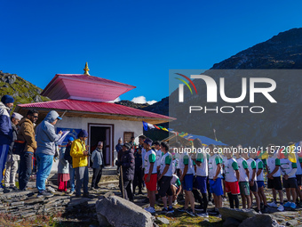 Runners participate in the first Timbung Pokhari Trail Run competition in Taplejung, Nepal, on September 11, 2024. (