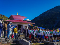 Runners participate in the first Timbung Pokhari Trail Run competition in Taplejung, Nepal, on September 11, 2024. (