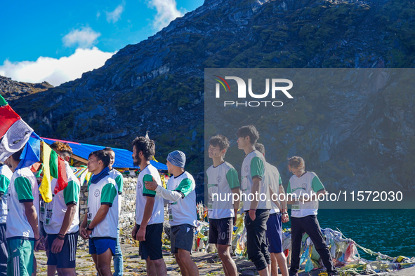 Runners participate in the first Timbung Pokhari Trail Run competition in Taplejung, Nepal, on September 11, 2024. 