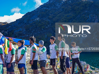 Runners participate in the first Timbung Pokhari Trail Run competition in Taplejung, Nepal, on September 11, 2024. (