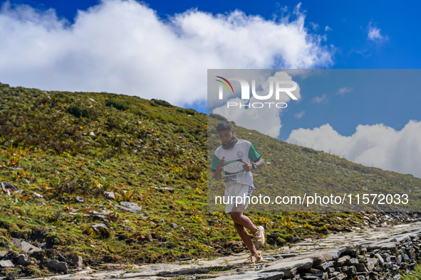 Runners participate in the first Timbung Pokhari Trail Run competition in Taplejung, Nepal, on September 11, 2024. 