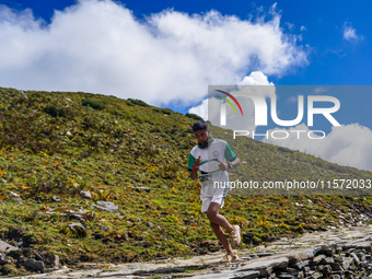 Runners participate in the first Timbung Pokhari Trail Run competition in Taplejung, Nepal, on September 11, 2024. (