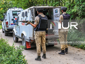 Security forces near the encounter site in which three militants are killed in Kreeri Tapper Pattan Baramulla, Jammu and Kashmir, India, on...