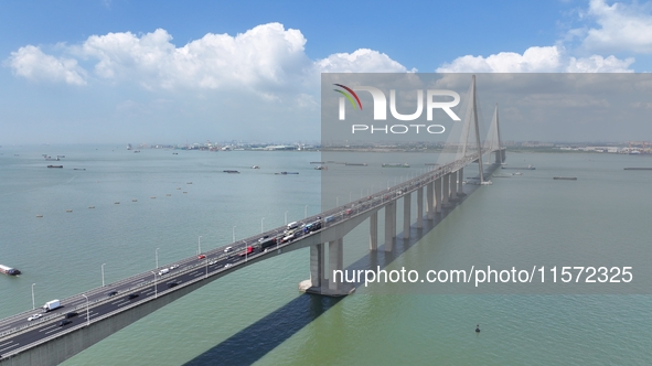 Vehicles travel on the Shanghai-Suzhou-Nantong Yangtze River Bridge in Suzhou, China, on September 14, 2024. 