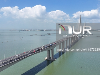 Vehicles travel on the Shanghai-Suzhou-Nantong Yangtze River Bridge in Suzhou, China, on September 14, 2024. (