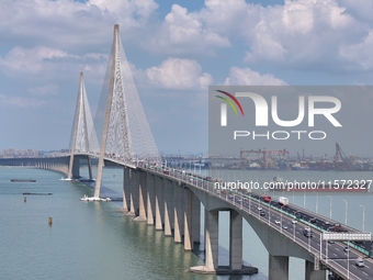 Vehicles travel on the Shanghai-Suzhou-Nantong Yangtze River Bridge in Suzhou, China, on September 14, 2024. (