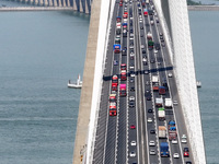 Vehicles travel on the Shanghai-Suzhou-Nantong Yangtze River Bridge in Suzhou, China, on September 14, 2024. (