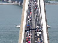 Vehicles travel on the Shanghai-Suzhou-Nantong Yangtze River Bridge in Suzhou, China, on September 14, 2024. (