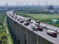 Vehicles travel on the Shanghai-Suzhou-Nantong Yangtze River Bridge in Suzhou, China, on September 14, 2024. (