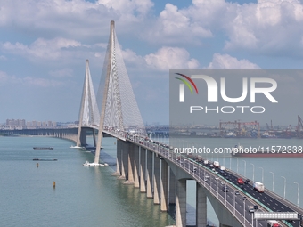 Vehicles travel on the Shanghai-Suzhou-Nantong Yangtze River Bridge in Suzhou, China, on September 14, 2024. (