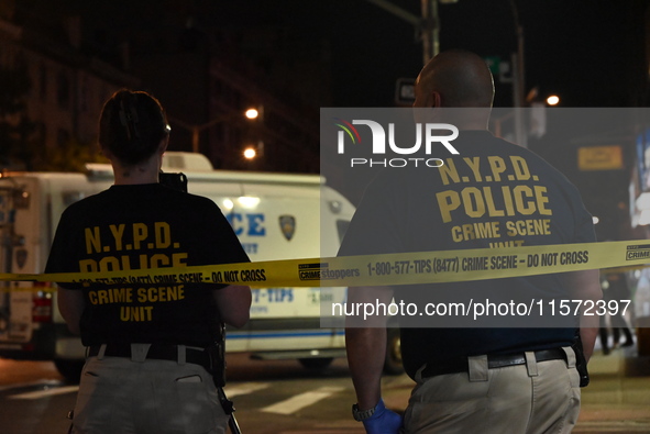 NYPD crime scene investigators are at the scene. A 24-year-old man is shot and killed in Bronx, New York, United States, on September 13, 20...