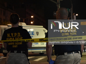 NYPD crime scene investigators are at the scene. A 24-year-old man is shot and killed in Bronx, New York, United States, on September 13, 20...