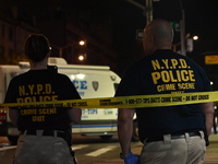 NYPD crime scene investigators are at the scene. A 24-year-old man is shot and killed in Bronx, New York, United States, on September 13, 20...