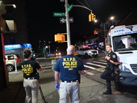 NYPD crime scene unit investigators are at the scene. A 24-year-old man is shot and killed in Bronx, New York, United States, on September 1...