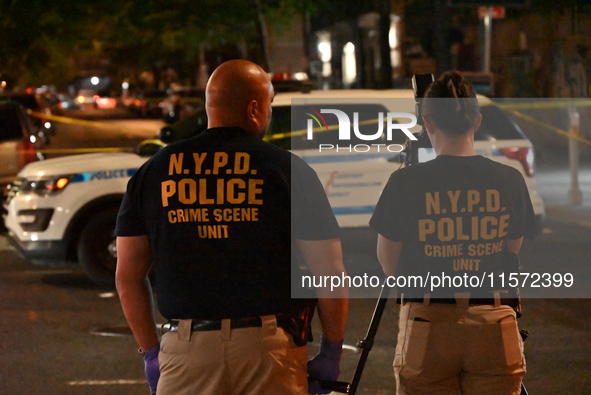 NYPD crime scene unit investigators are at the scene. A 24-year-old man is shot and killed in Bronx, New York, United States, on September 1...