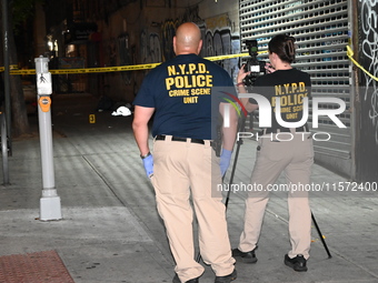 NYPD crime scene unit investigators are at the scene. A 24-year-old man is shot and killed in Bronx, New York, United States, on September 1...