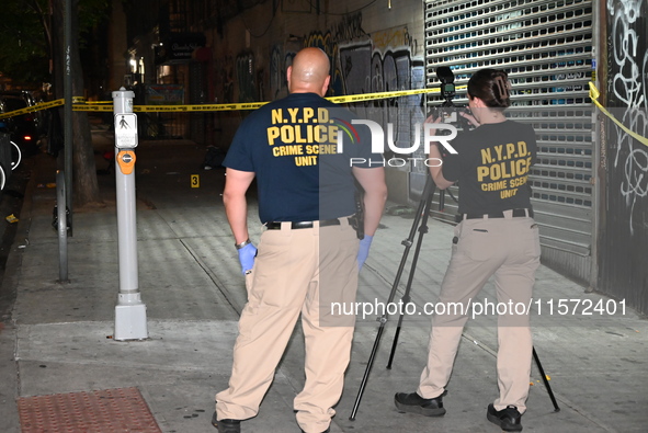 NYPD crime scene unit investigators are at the scene. A 24-year-old man is shot and killed in Bronx, New York, United States, on September 1...