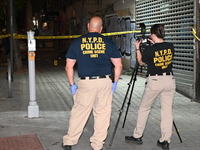 NYPD crime scene unit investigators are at the scene. A 24-year-old man is shot and killed in Bronx, New York, United States, on September 1...