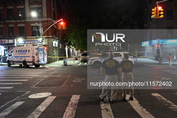 NYPD crime scene unit investigators are at the scene. A 24-year-old man is shot and killed in Bronx, New York, United States, on September 1...