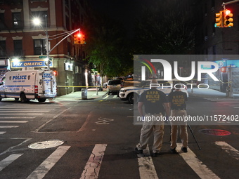 NYPD crime scene unit investigators are at the scene. A 24-year-old man is shot and killed in Bronx, New York, United States, on September 1...