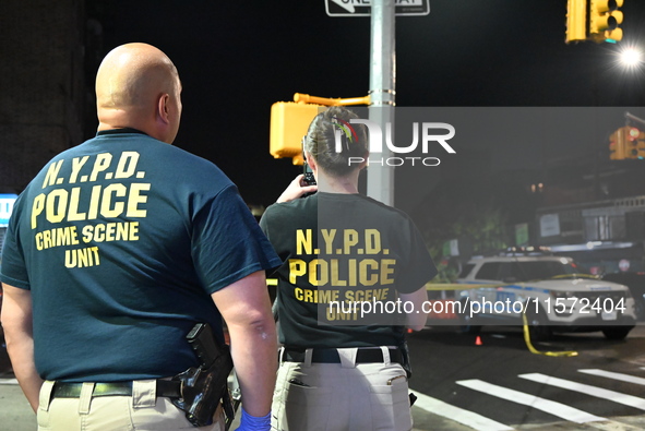 NYPD crime scene unit investigators are at the scene. A 24-year-old man is shot and killed in Bronx, New York, United States, on September 1...