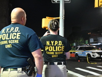 NYPD crime scene unit investigators are at the scene. A 24-year-old man is shot and killed in Bronx, New York, United States, on September 1...