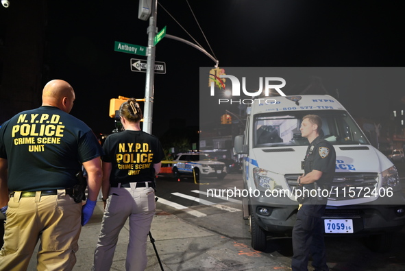 NYPD crime scene unit investigators are at the scene. A 24-year-old man is shot and killed in Bronx, New York, United States, on September 1...