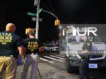 NYPD crime scene unit investigators are at the scene. A 24-year-old man is shot and killed in Bronx, New York, United States, on September 1...