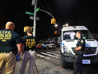 NYPD crime scene unit investigators are at the scene. A 24-year-old man is shot and killed in Bronx, New York, United States, on September 1...